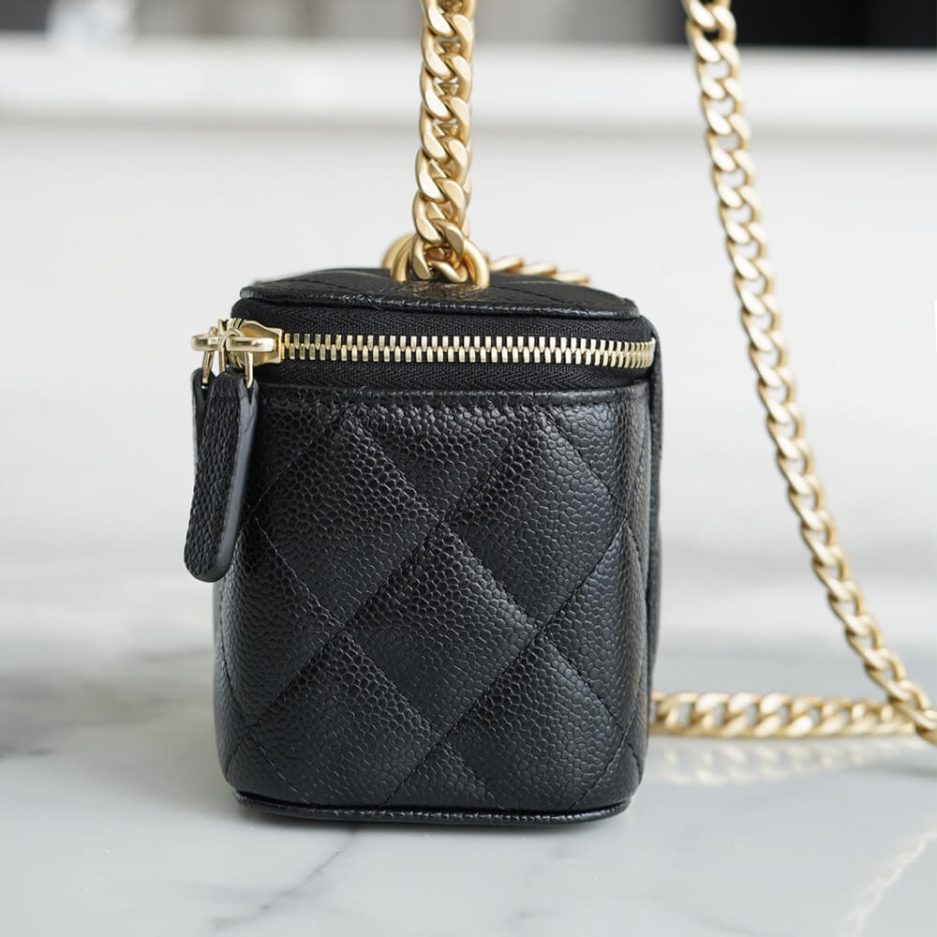 Ch*el small gold ball makeup bag
